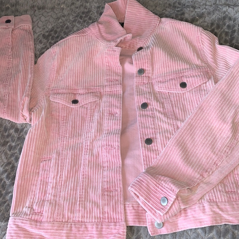 Pink h&m jacket has been worn still has tags on it